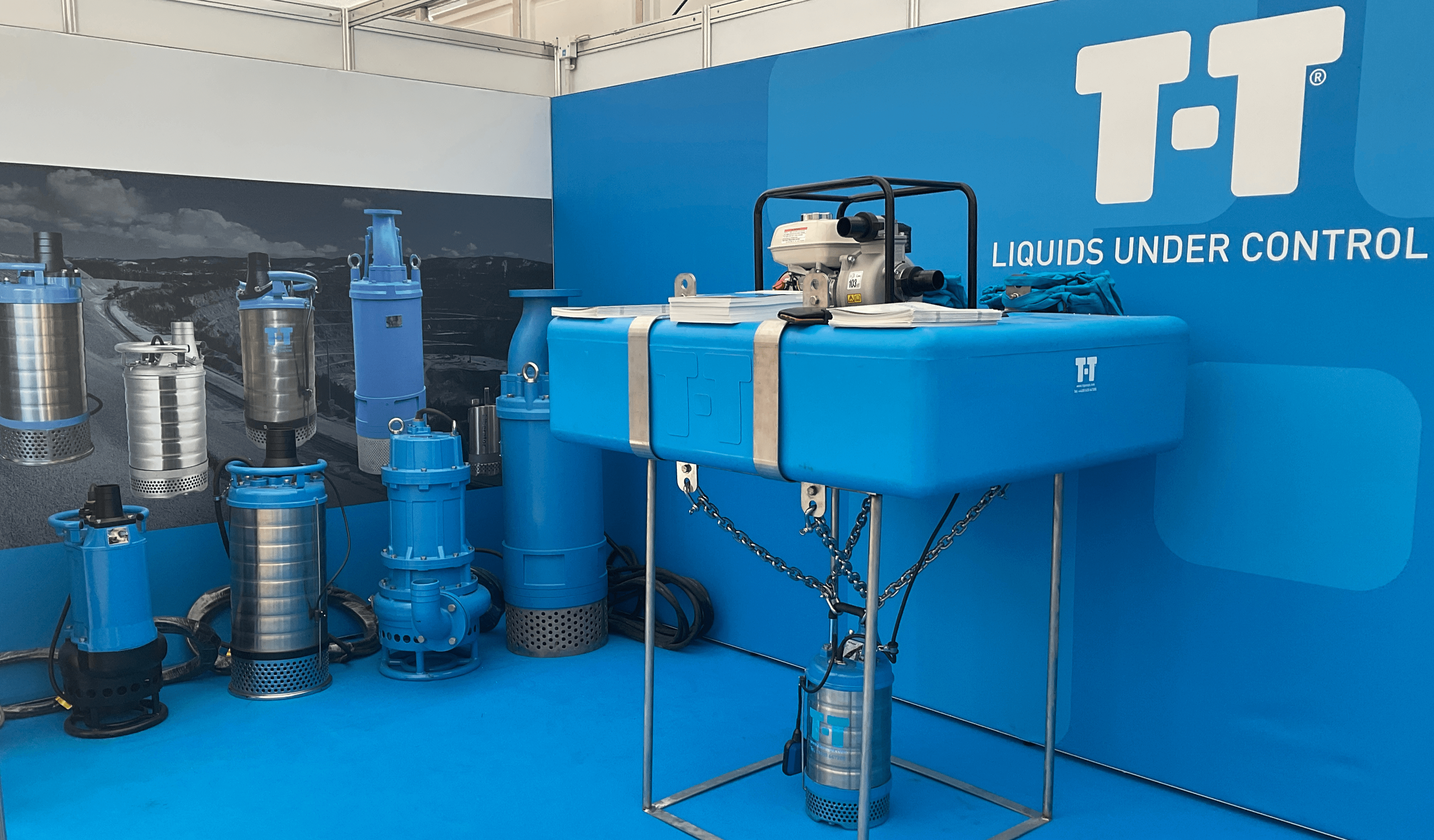 Blue T-T Hillhead 2022 exhibition stand displaying heavy-duty pumps and floatation equipment.